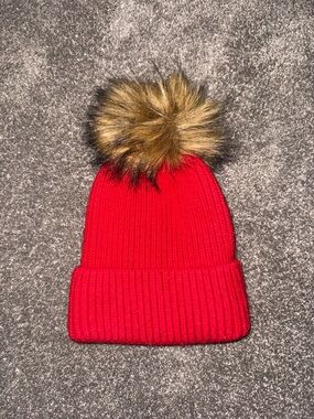 Women’s Red Ribbed Beanie with Faux Fur Pom Pom